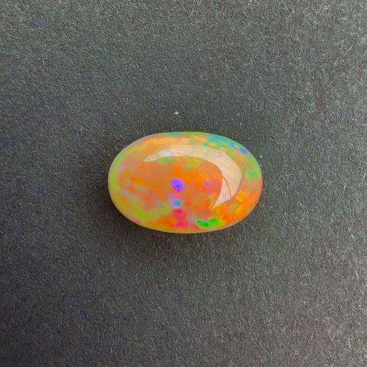 1.3cts Dark Opal With A Red Pink Multicolor Play Of Color, From Lightning Ridge Australia