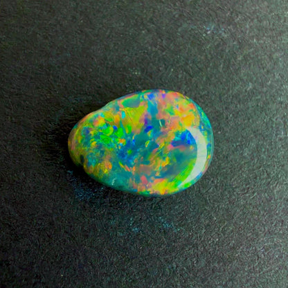 0.46cts Black Opal With A Red Pink Multicolor Play Of Color, From Lightning Ridge Australia