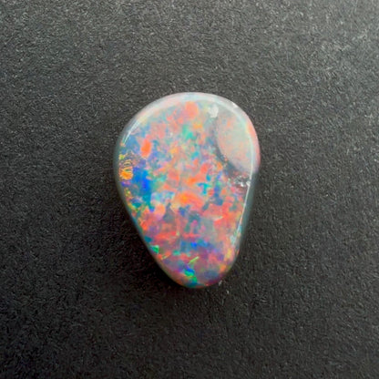 0.69cts Black Opal With A Red Pink Multicolor Play Of Color, From Lightning Ridge Australia