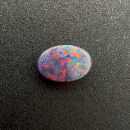 0.58cts Dark Opal With A Red Pink Multicolor Play Of Color, From Lightning Ridge Australia
