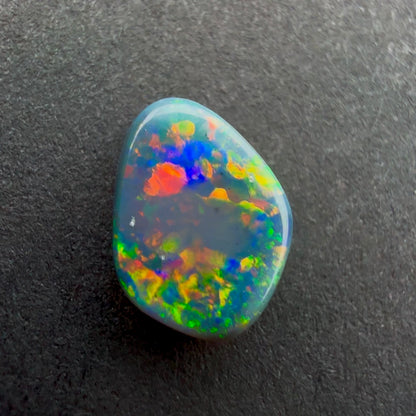 0.45cts Black Opal With A Red Pink Multicolor Play Of Color, From Lightning Ridge Australia