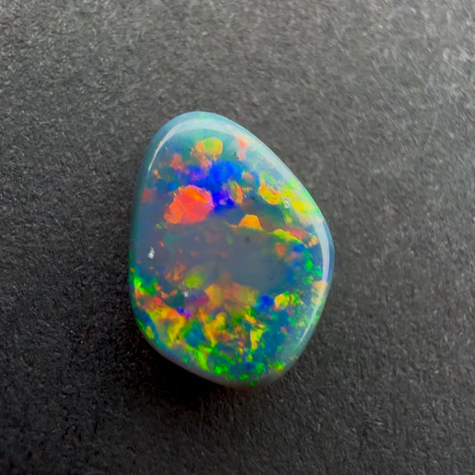 0.45cts Black Opal With A Red Pink Multicolor Play Of Color, From Lightning Ridge Australia