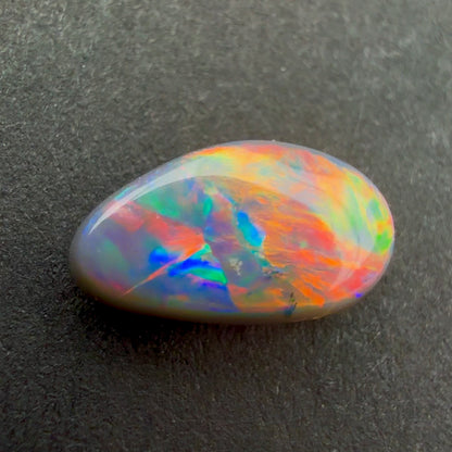 0.95cts Dark Opal With A Red Pink Multicolor Play Of Color, From Lightning Ridge Australia