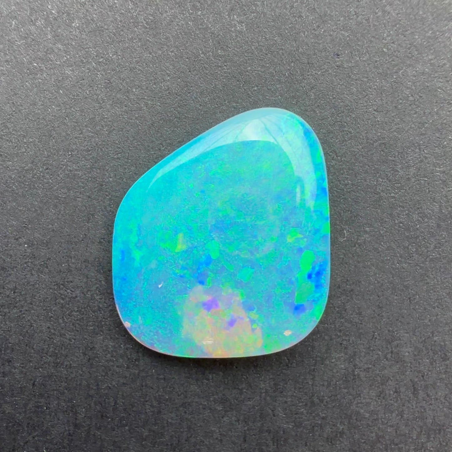 3.59cts Crystal Opal With A Green Blue Play Of Color, From Lightning Ridge Australia