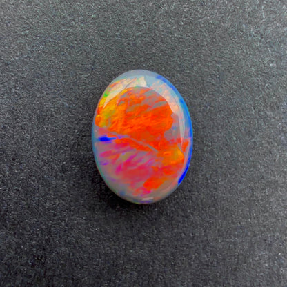 0.66cts Black Opal With A Red Pink Multicolor Play Of Color, From Lightning Ridge Australia