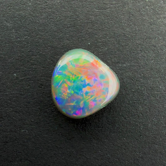 0.82cts Dark Opal With A Red Pink Multicolor Play Of Color, From Lightning Ridge Australia