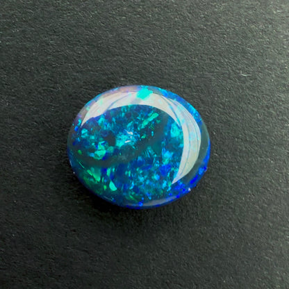 0.87cts Black Opal With A Dark Blue Green Play Of Color, From Lightning Ridge Australia