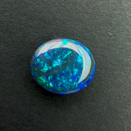 0.87cts Black Opal With A Dark Blue Green Play Of Color, From Lightning Ridge Australia