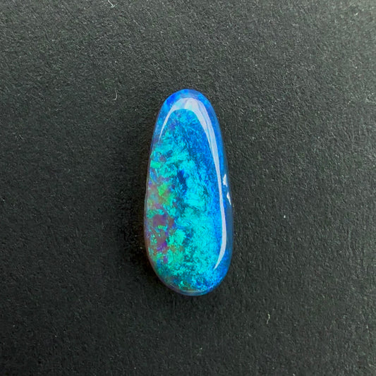 0.71cts Dark Opal With A Dark Blue Green Play Of Color, From Lightning Ridge Australia