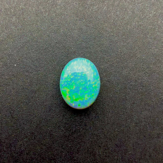 0.9cts Affordable Dark Opal With A Green Yellow Gold Play Of Color, From Lightning Ridge Australia