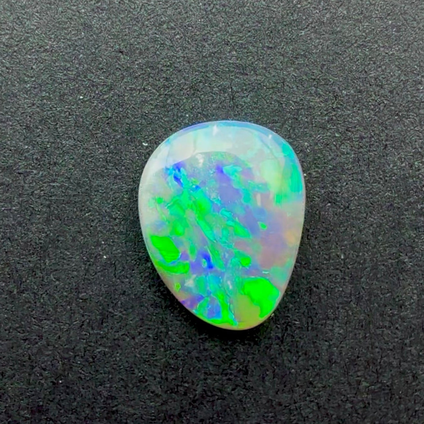 0.64cts Affordable Dark Opal With A Green Blue Play Of Color, From Lightning Ridge Australia