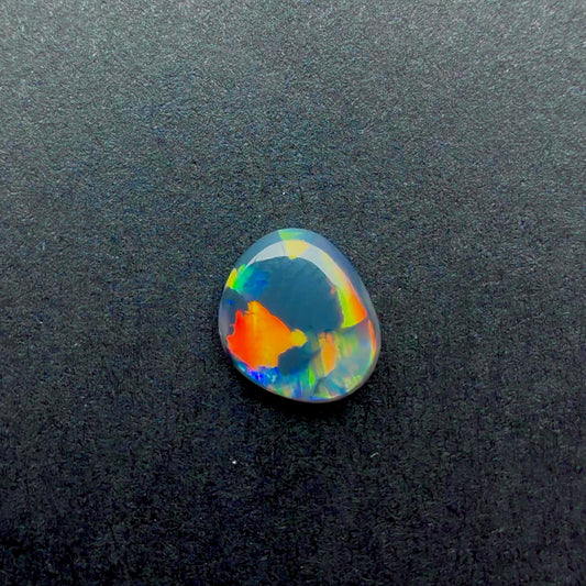0.62cts Affordable Dark Opal With A Red Pink Multicolor Play Of Color, From Lightning Ridge Australia