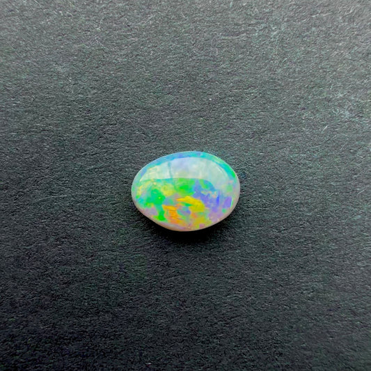 0.38cts Affordable Dark Opal With A Green, Yellow, Gold Multicolor Play Of Color, From Lightning Ridge Australia