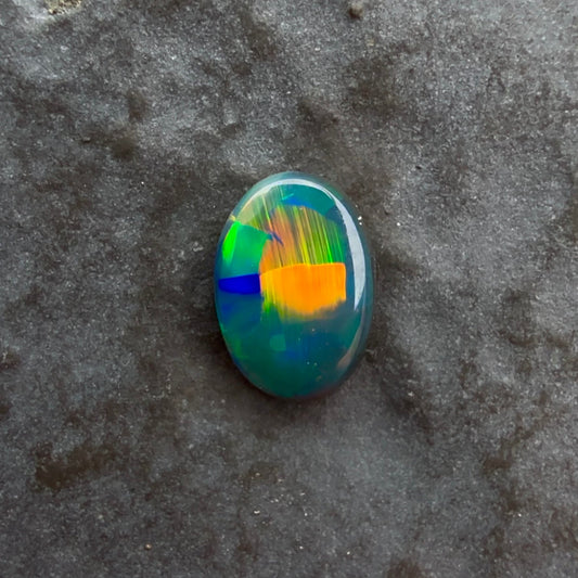 6mm x 4mm Top Quality Black Opal With Green, Yellow, Gold Play Of Color, From Lightning Ridge Australia