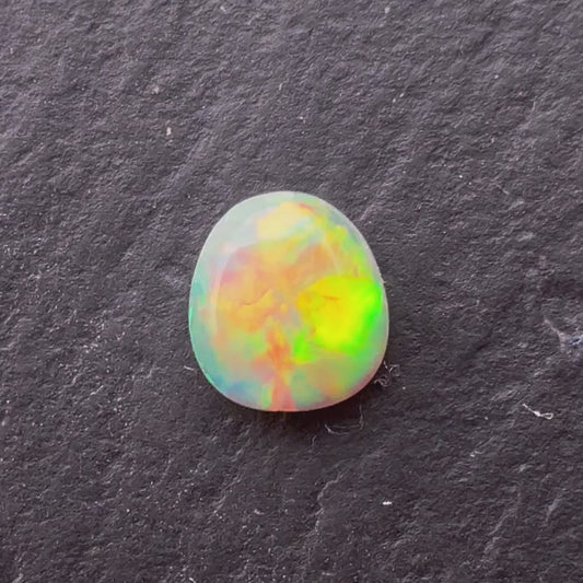 0.39ct Crystal Opal With A Red, Pink Multicolor Play Of Color, From Lightning Ridge Australia