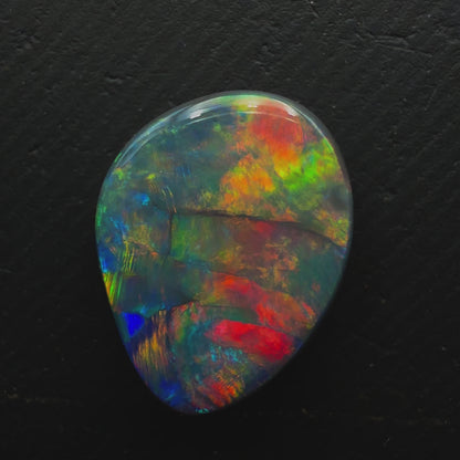 6.1ct Gem Black Opal With A Red-Multicolor Palette and Rare Flagstone Pattern