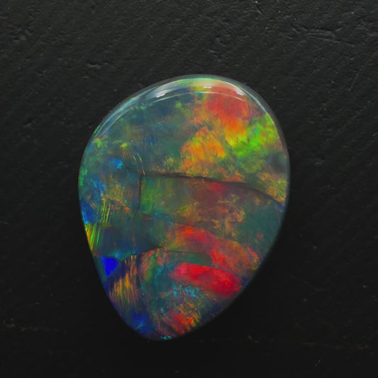 6.1ct Gem Black Opal With A Red-Multicolor Palette and Rare Flagstone Pattern