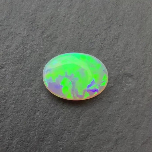 0.73ct Crystal Opal With A Green, Yellow, Gold Play Of Color, From Lightning Ridge Australia