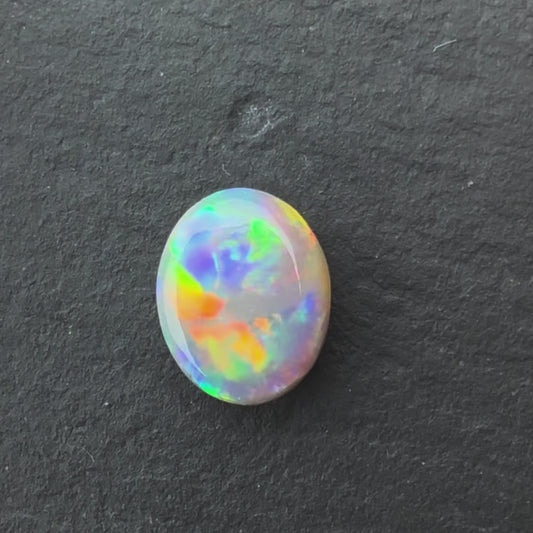 0.94ct Crystal Opal With A Red, Pink Multicolor Play Of Color, From Lightning Ridge Australia