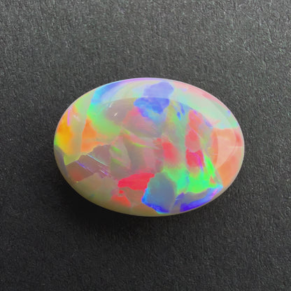 3cts Dark Opal With A Red Pink Multicolor Play Of Color, From Lightning Ridge Australia
