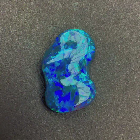 3.66ct Black Opal Carving With A Dark Blue Green Play Of Color, From Lightning Ridge Australia