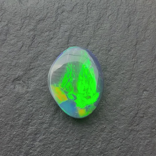 0.96ct Black Opal With A Green, Yellow, Gold Play Of Color, From Lightning Ridge Australia
