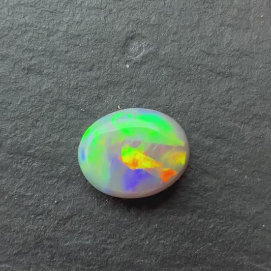 0.83ct Opal With A Red, Pink Multicolor Play Of Color, From Lightning Ridge Australia