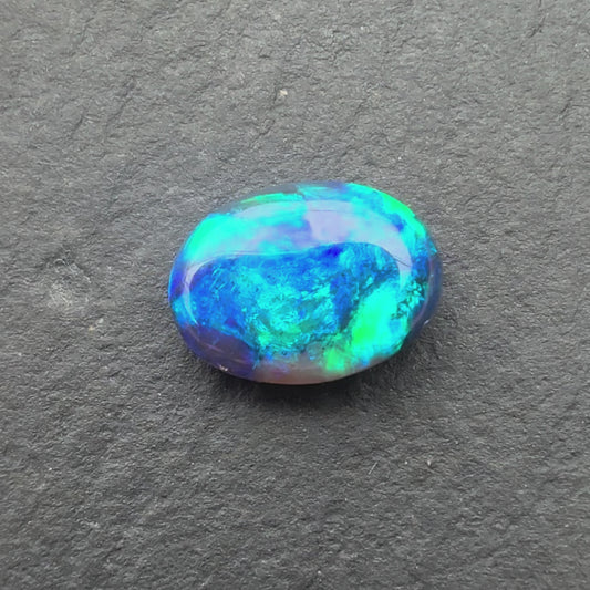 0.90ct Semi-Black Opal With A Green, Blue Play Of Color, From Lightning Ridge Australia