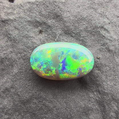 1cts Affordable Dark Opal With A Green Yellow Gold color Palette