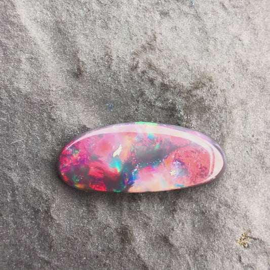 0.8cts Affordable Black Opal With A Vivid Red Pink Multicolor Play Of Color, From Lightning Ridge Australia