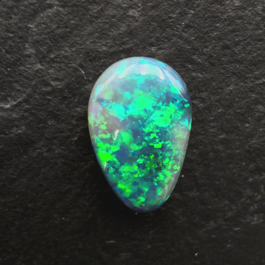 1.46ct Affordable Black Opal With speckled Blue-Green Color