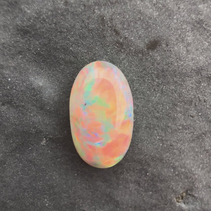 0.55cts Affordable Crystal Opal With A Red Multicolor Play Of Color, From Lightning Ridge Australia