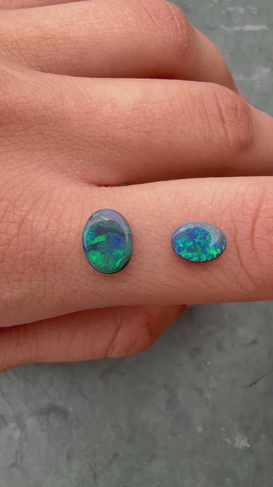 0.69ct and 0.93ct Black Opals With A Green, Blue Play Of Color, From Lightning Ridge Australia