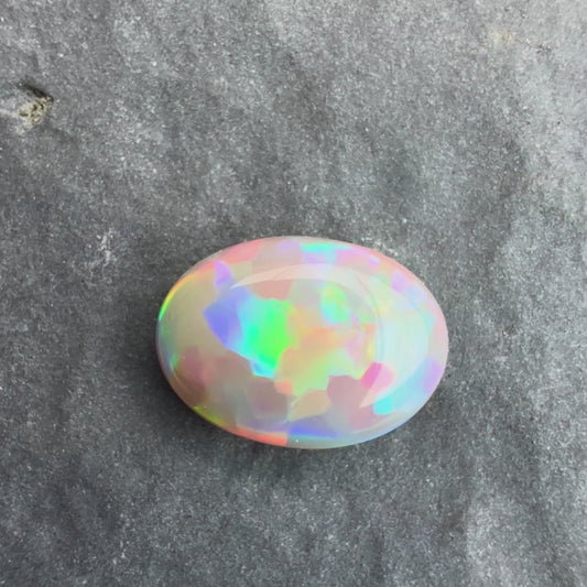 0.96cts Affordable Dark Opal With A Red Multicolor Play Of Color, From Lightning Ridge Australia