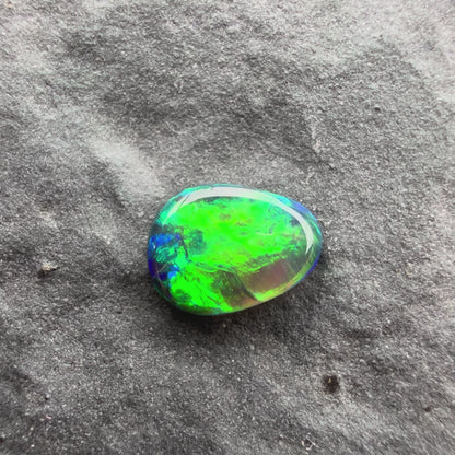 0.24cts Top Gem Micro Black Opal With A Green, Gold Broadflash Pattern Pattern