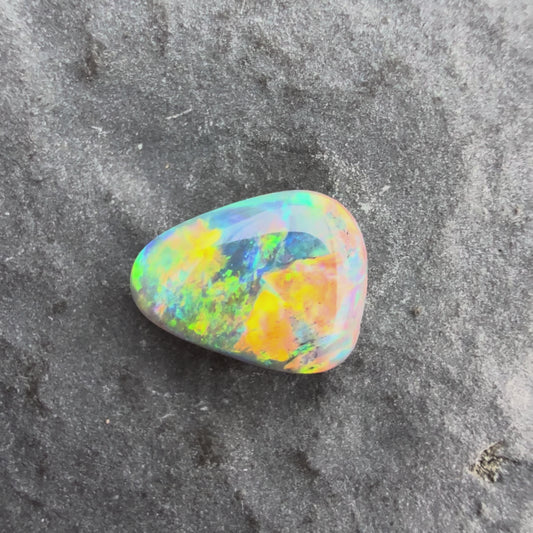 0.6cts Gem Black Opal With A Vivid Red Pink Multicolor Play Of Color, From Lightning Ridge Australia