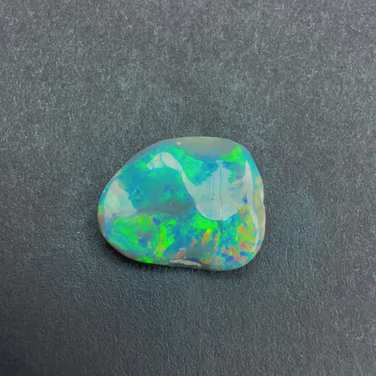 1.84cts Dark Opal Carving With A Red Pink Multicolor Play Of Color, From Lightning Ridge Australia