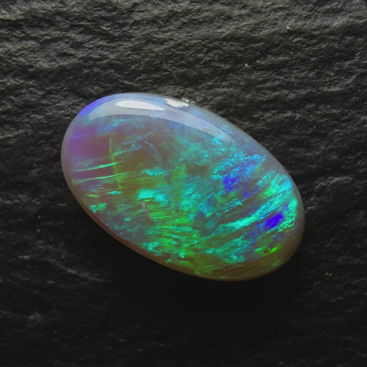 1.0ct Dark Opal, This Gem Has A Minty Green-Blue Color Palette And A Textured Broadflash Pattern