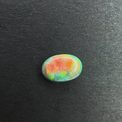 0.47cts Affordable Black Opal With A Red Pink Multicolor Play Of Color, From Lightning Ridge Australia