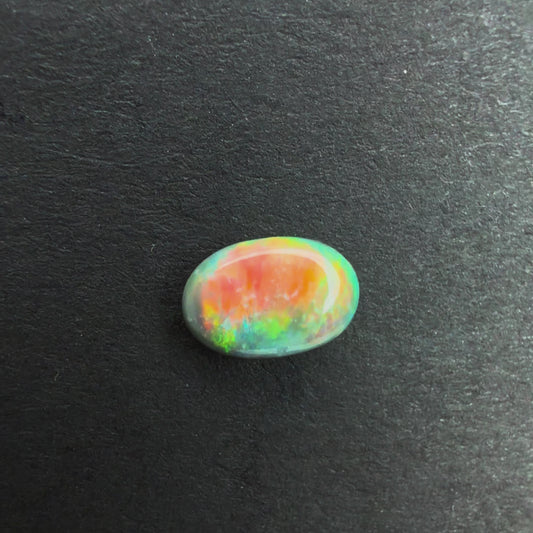 0.47cts Affordable Black Opal With A Red Pink Multicolor Play Of Color, From Lightning Ridge Australia