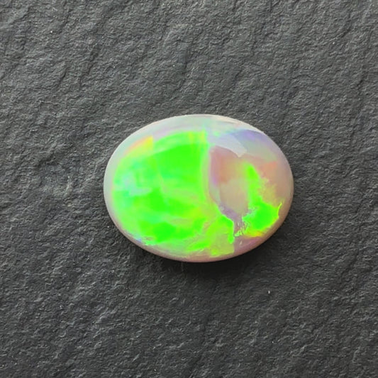 1.54ct Dark Opal Opal With A Green, Yellow, Gold Play Of Color, From Lightning Ridge Australia