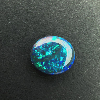 0.87cts Black Opal With A Dark Blue Green Play Of Color, From Lightning Ridge Australia