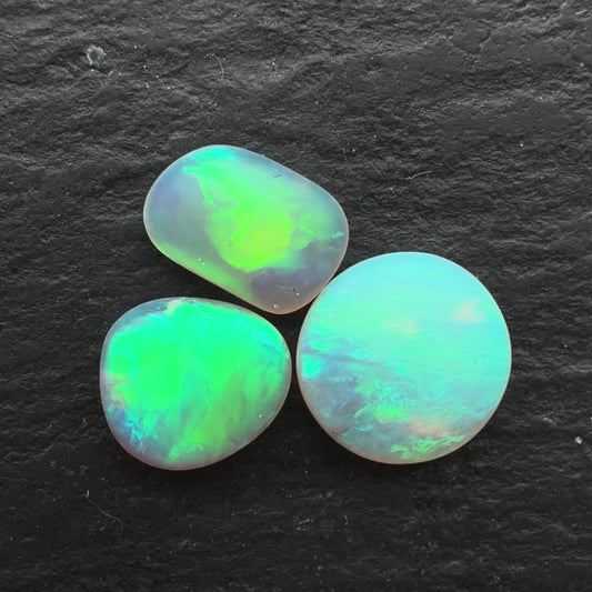 1.1ct Bundle (Price For Parcel) Matte finished opals with a soft purple-green glow
