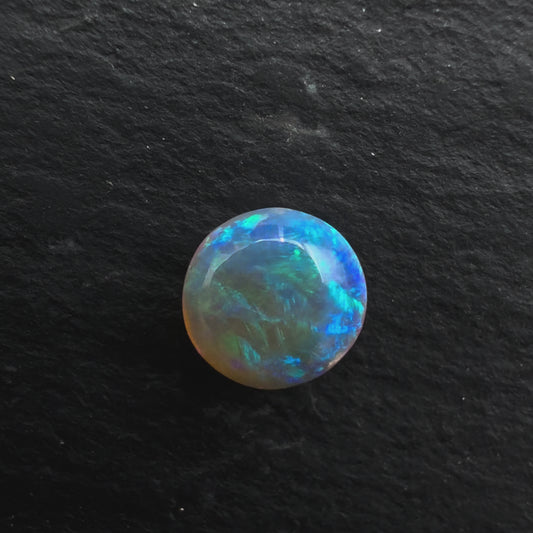 0.65ct Affordable Round Crystal Opal With Rich pastel Greens and Blues