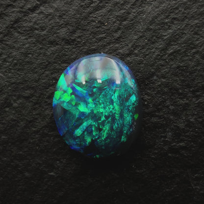0.73cts Black Opals With Vivid Blue-Green Color Play And A Moss Pattern