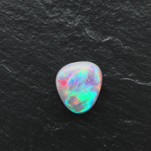 2.2ct Dark Opal With pastel Red Blue and Hints Of Green