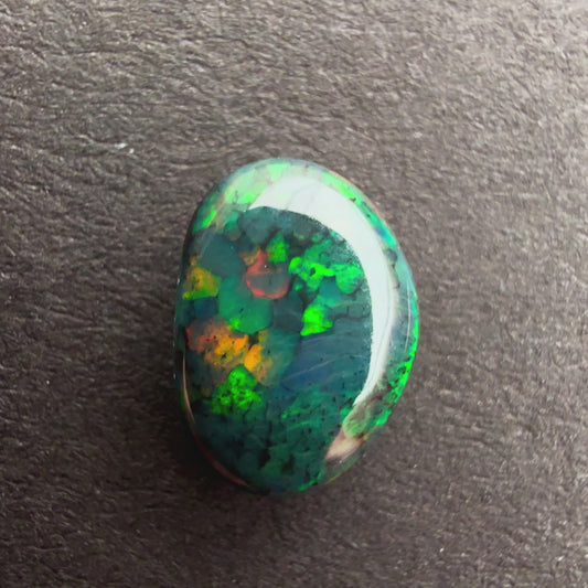 0.76cts Unique Black Opal With A Forrest Green Multicolor Play Of Color, From Lightning Ridge Australia
