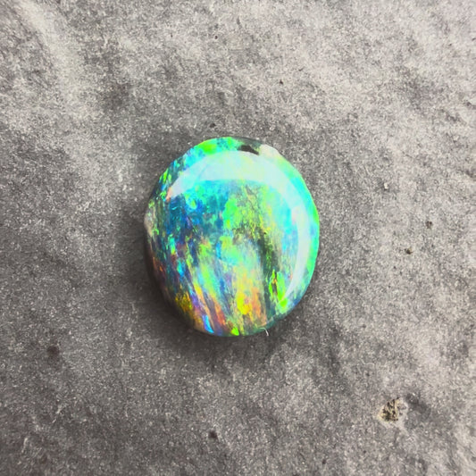 0.83cts Black Opal With A Red Blue Multicolor Play Of Color, From Lightning Ridge Australia