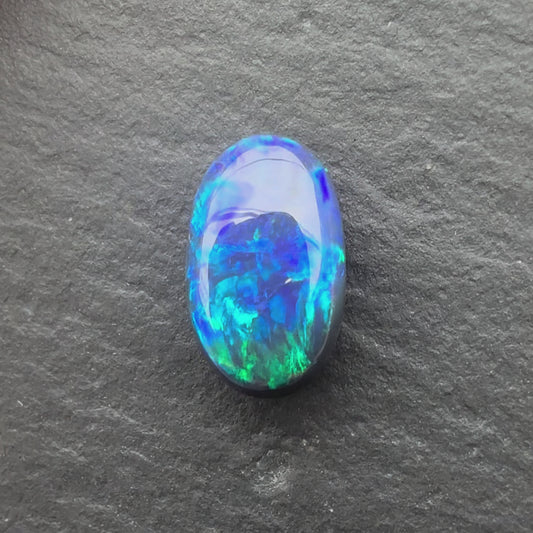 1.22ct Black Opal With A Dark Blue, Green Play Of Color, From Lightning Ridge Australia