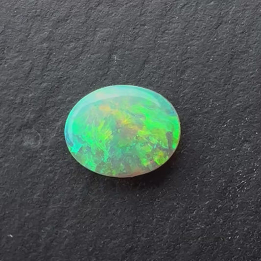 0.94 Crystal Opal With A Green, Yellow, Gold Play Of Color, From Lightning Ridge Australia
